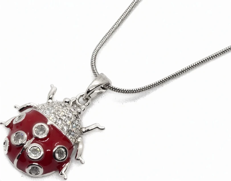 Cadena de acero quirurgico con dije vaquita de san antonio roja con stras 40cm + 5cm